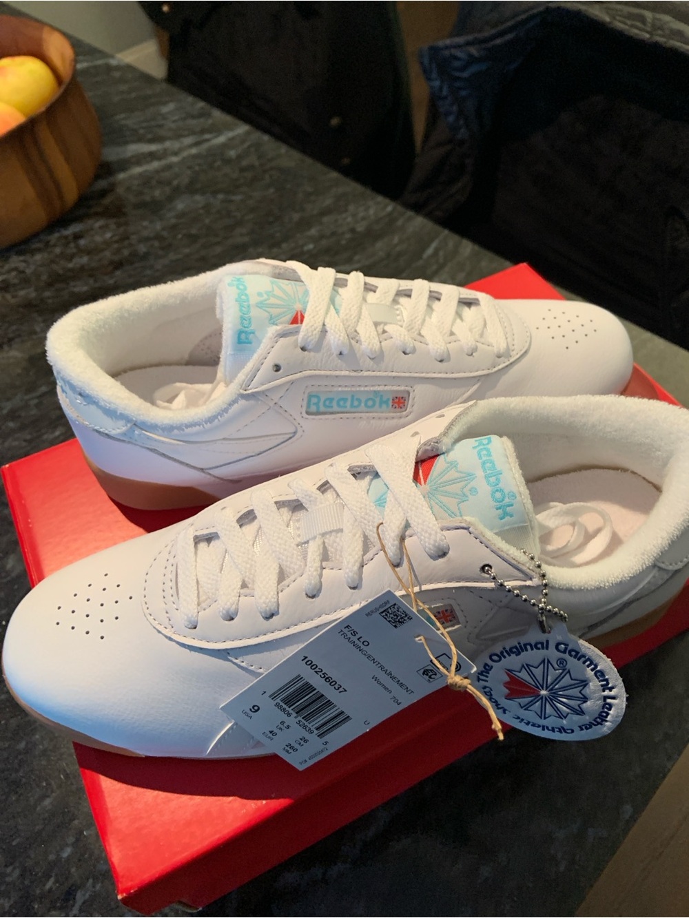 Reebok White Sneakers with Light Blue Accents